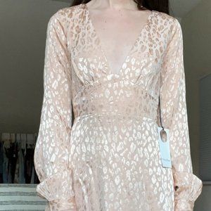 V-neck long sleeve open back mini dress